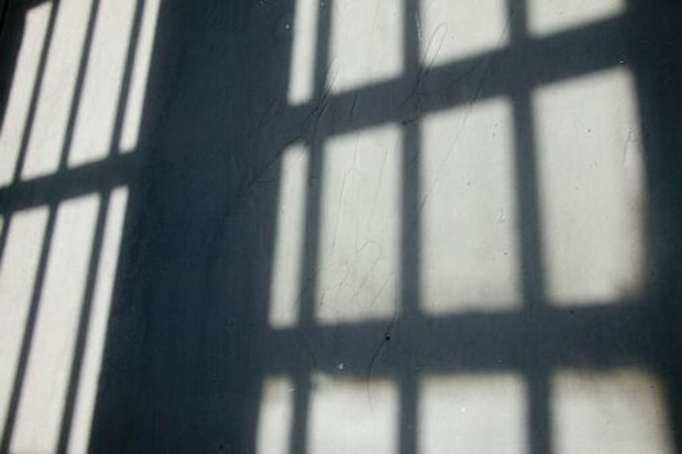 Shadow_prison_cell_bars_13